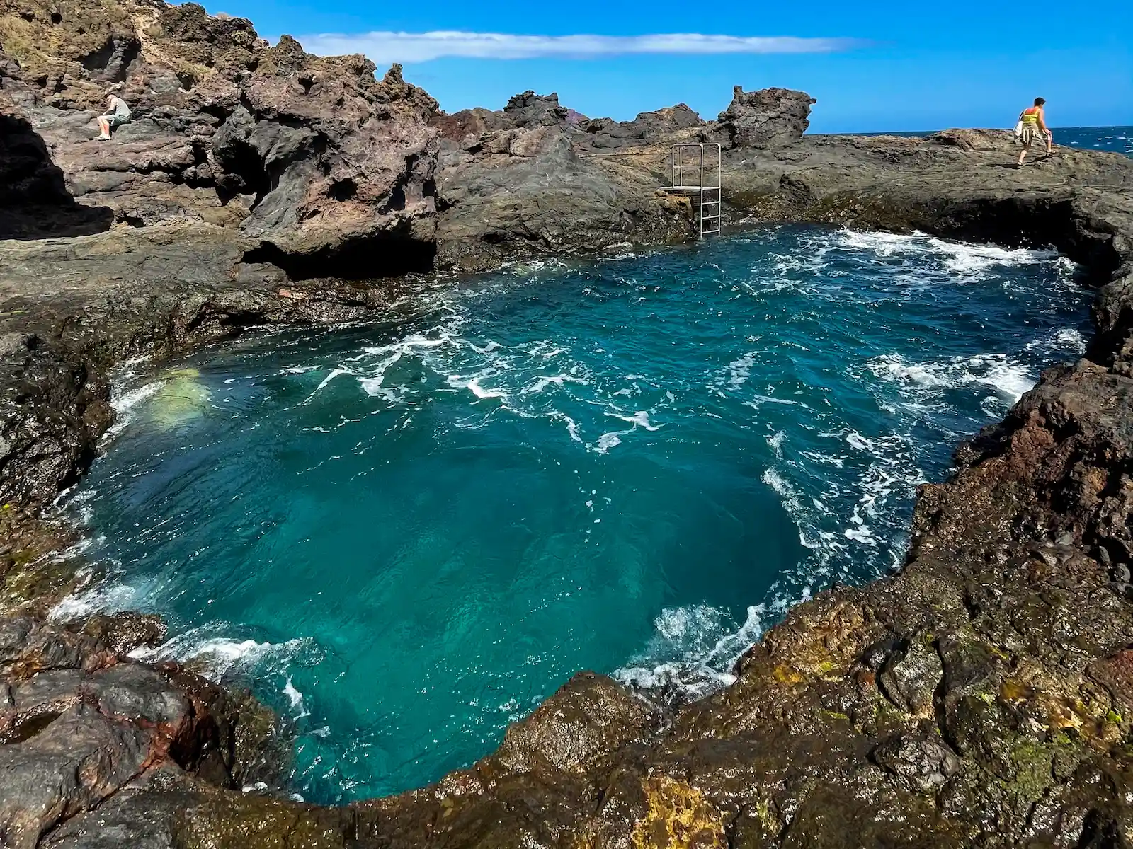 Los Abrigos natural pool during high tide with ocean waves