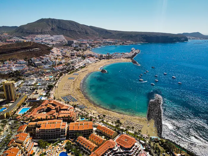 Wide aerial view of Los Cristianos Beach and surrounding area