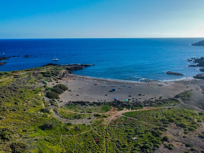 Coastal view of Abades Beach Tenerife with volcanic landscape and ocean.
