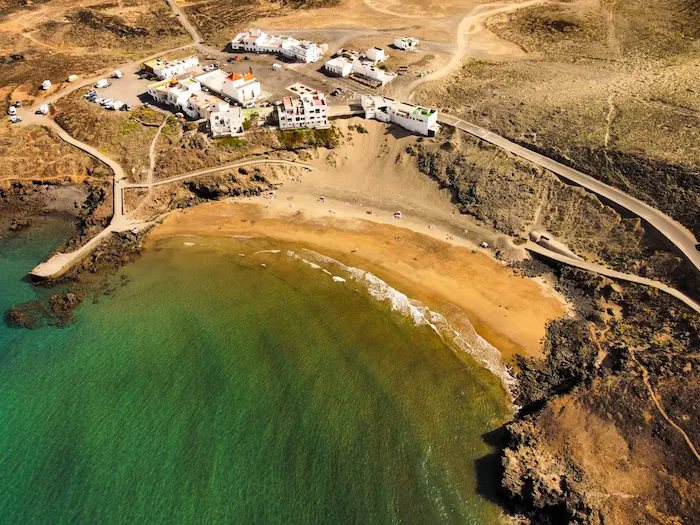 Aerial view of Playa Grande beach and small coastal village near Abades, Tenerife