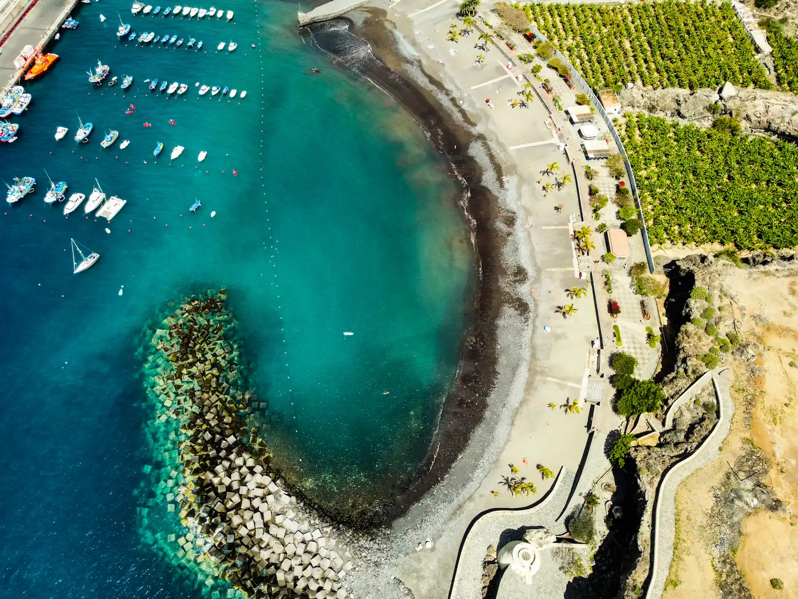 Aerial view of Playa San Juan Tenerife and calm turquoise water