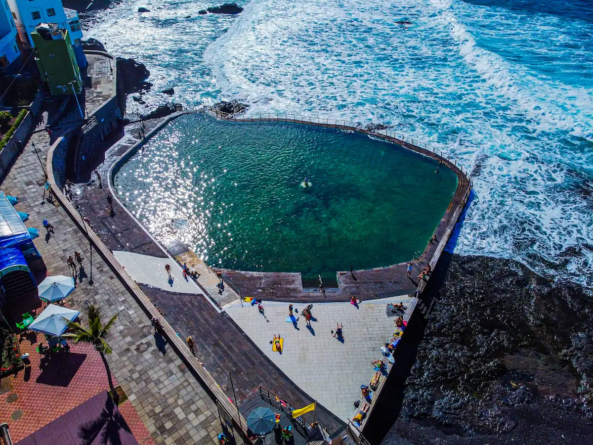 Punta del Hidalgo natural pool from above with turquoise water and waves