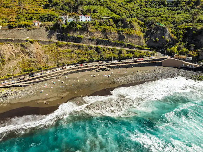 Curved coastline of El Socorro Beach Tenerife seen from above