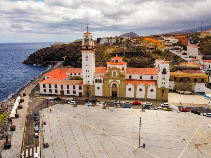 Aerial view of Basilica of Candelaria and colorful hillside homes