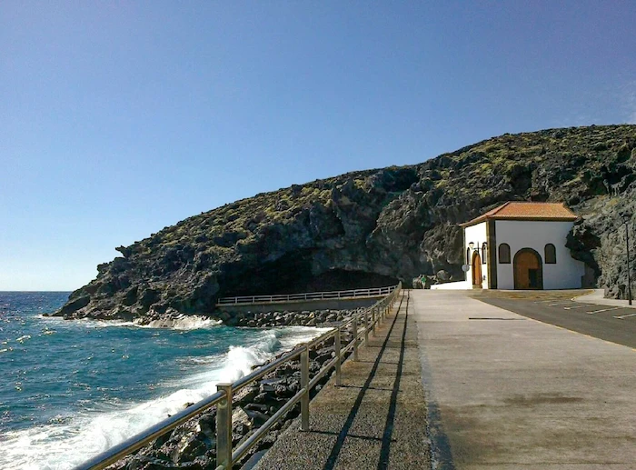 Small white chapel by the ocean in Candelaria, Tenerife