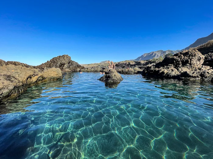 Charco de las Mujeres natural pool with clear turquoise water in Buenavista del Norte