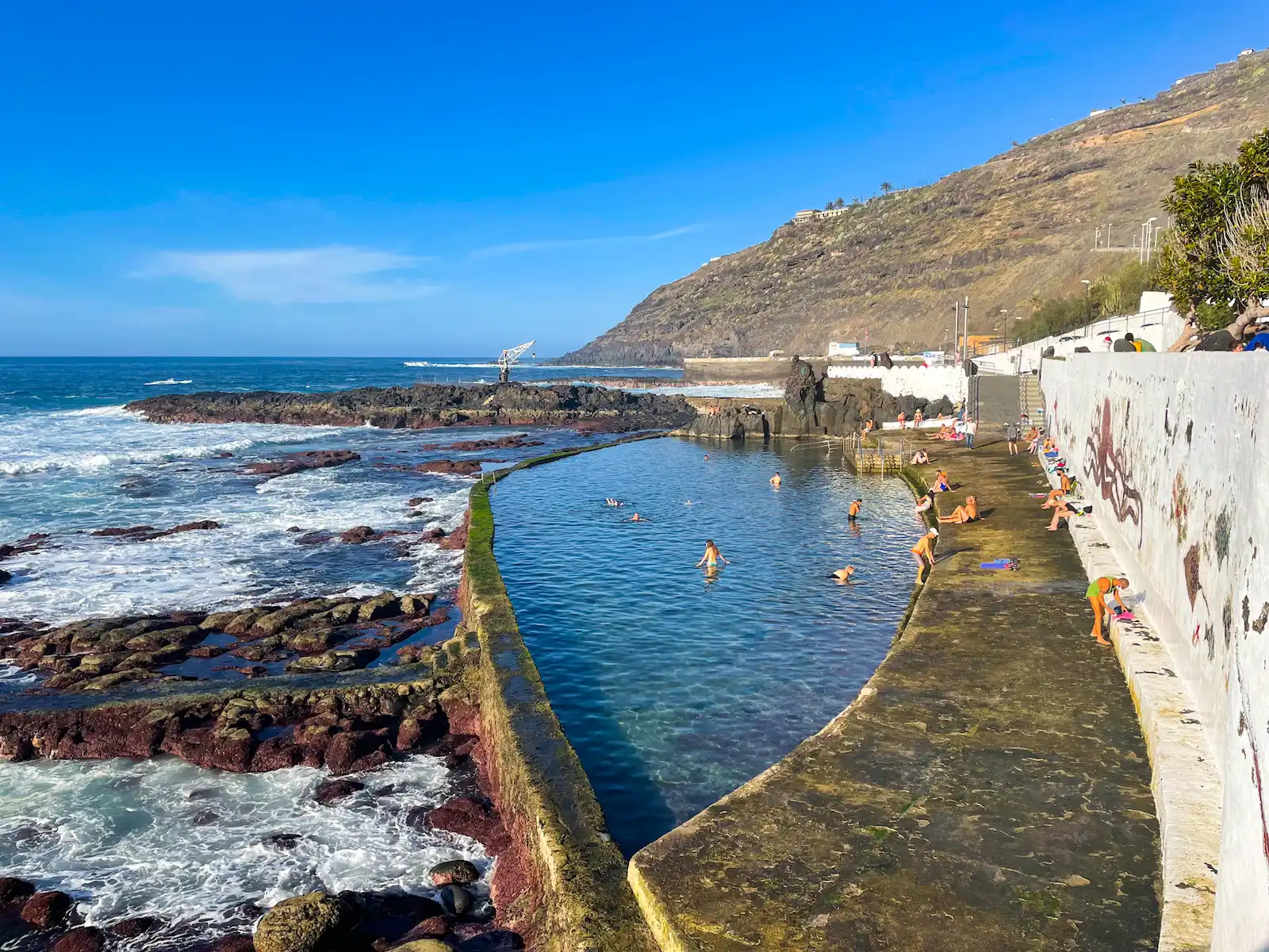 swimmers enjoying El Pris natural pool in Tenerife