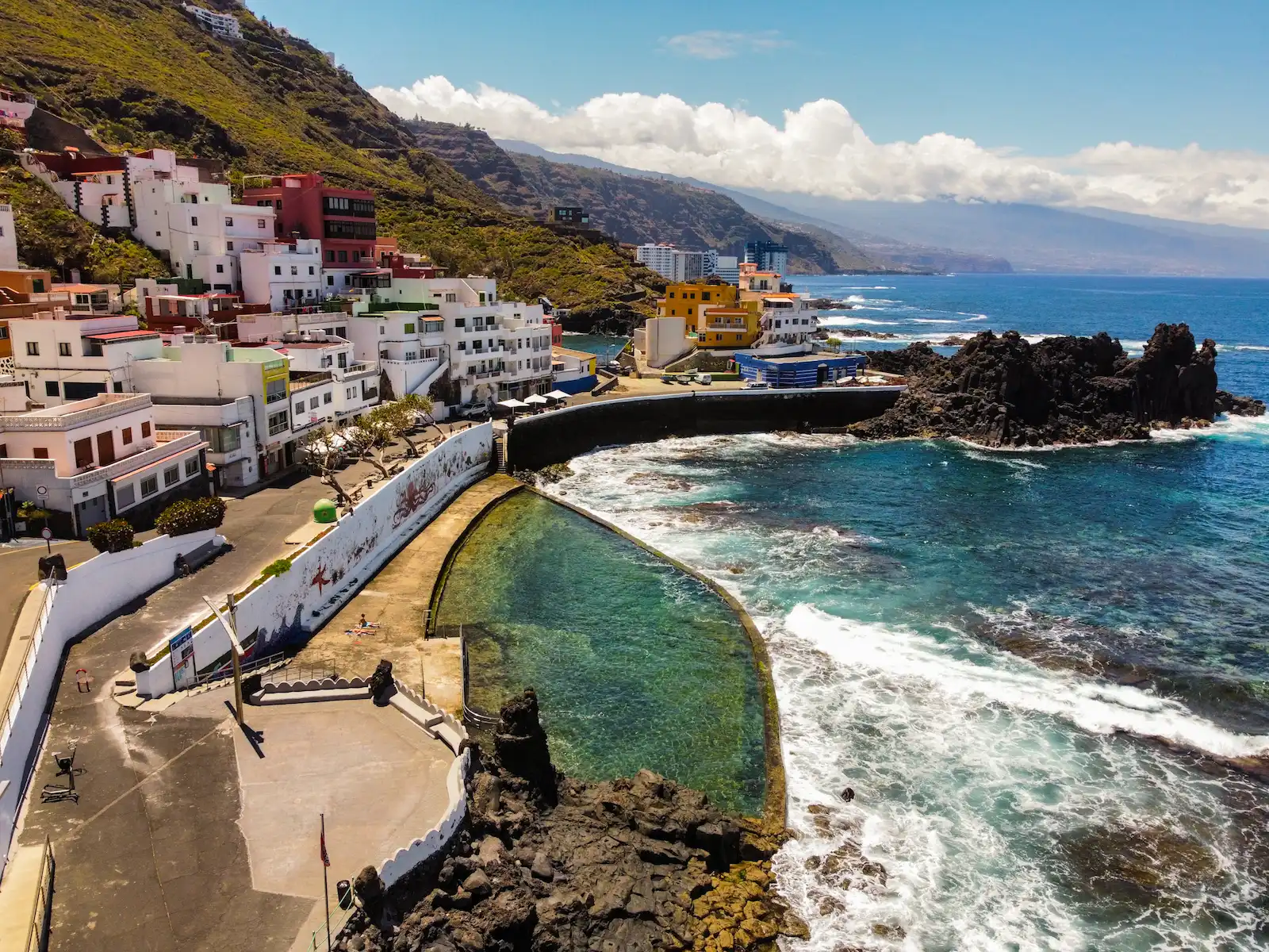 natural pool in El Pris Tenerife with ocean and town