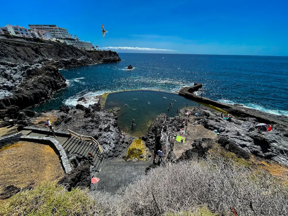 Los Gigantes natural pool with access stairs and ocean view