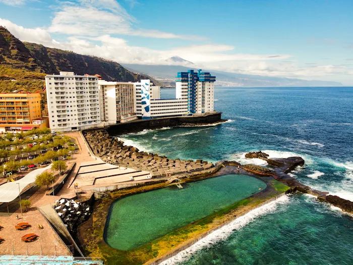 Mesa del Mar natural pool next to oceanfront buildings