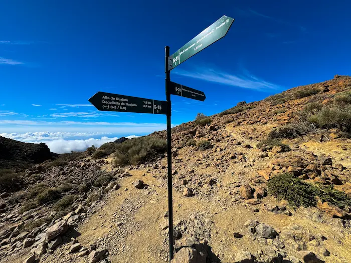 Trail signpost showing direction to Alto de Guajara and other routes