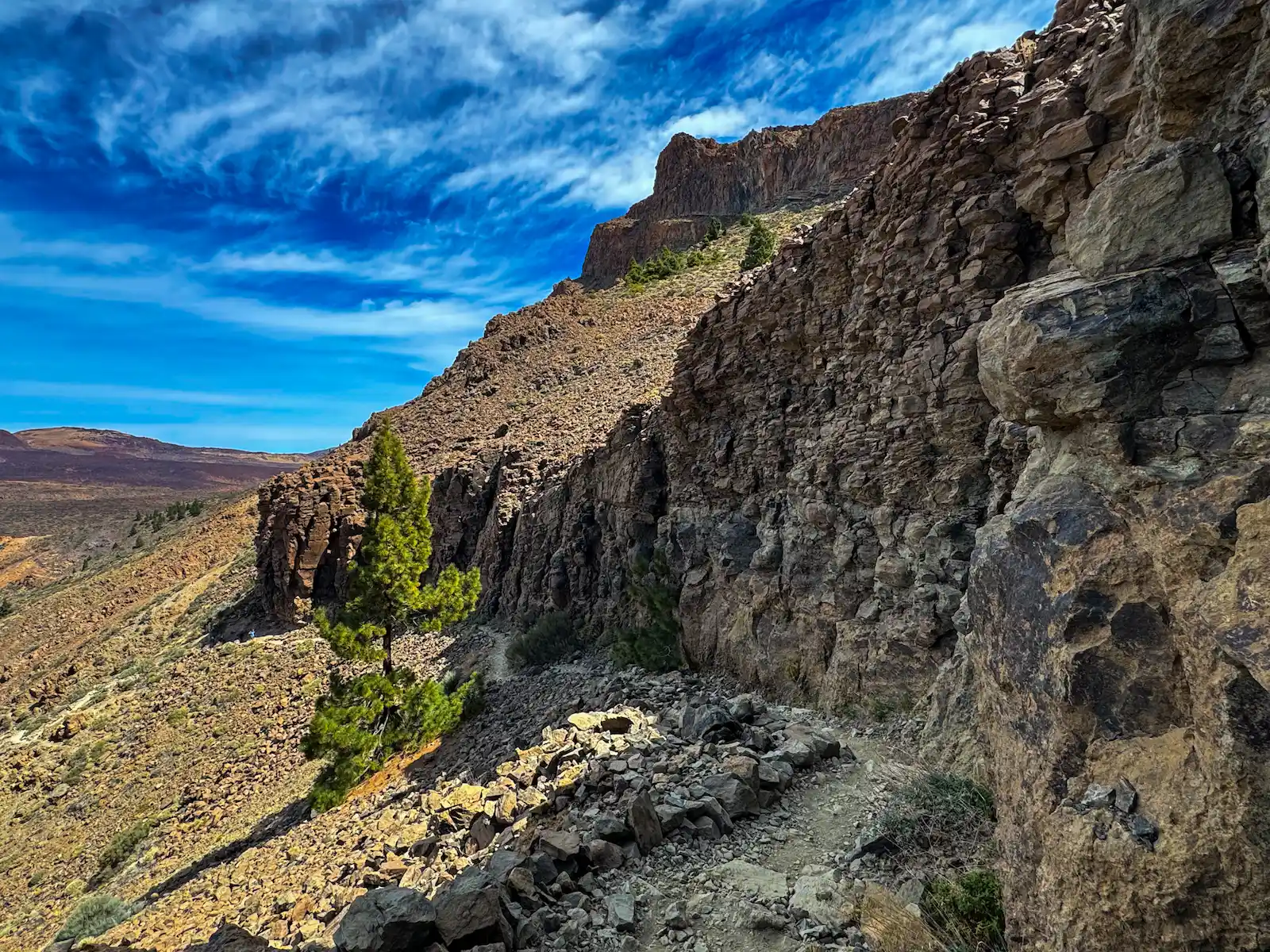 Rocky section of Alto de Guajara hike with stone walls