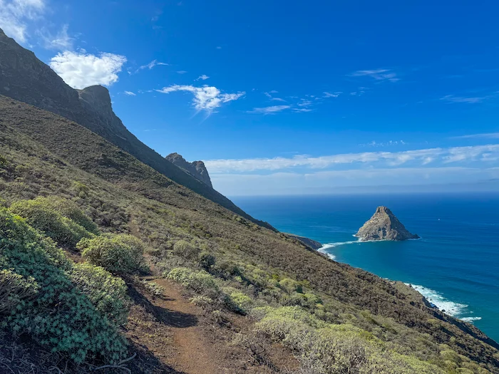 Trail above the ocean with view of Roque de Dentro in Anaga