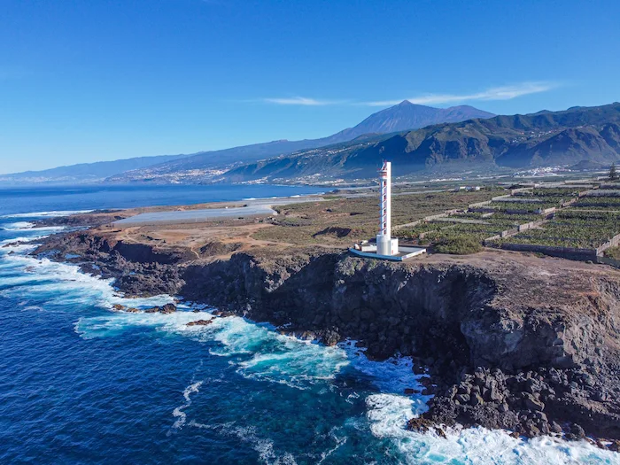 Faro de Buenavista del Norte lighthouse with waves crashing below