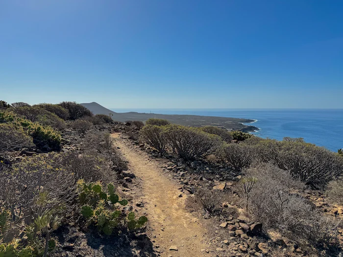 Dirt hiking trail with ocean views near Palm-Mar