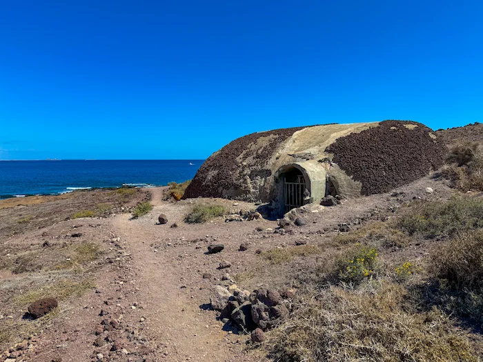 Path from Montaña Roja toward El Médano with coastline in view