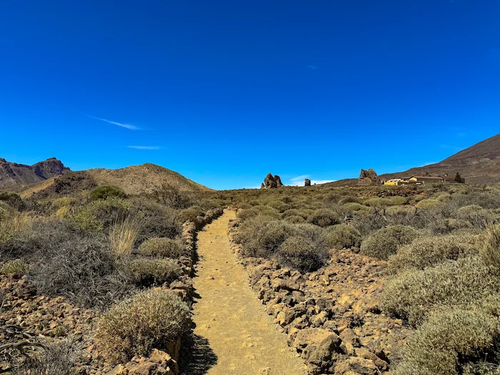 Roques de García trail path across low volcanic hills