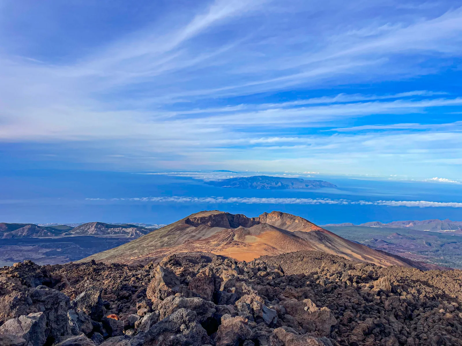 View over Pico Viejo crater with La Gomera in the distance