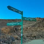 Trail sign showing hiking directions in Teide National Park
