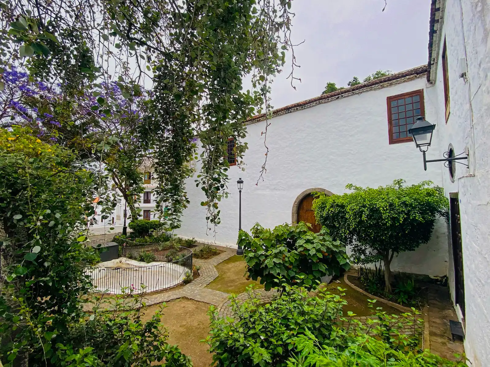 White-walled public library surrounded by gardens in Icod de los Vinos