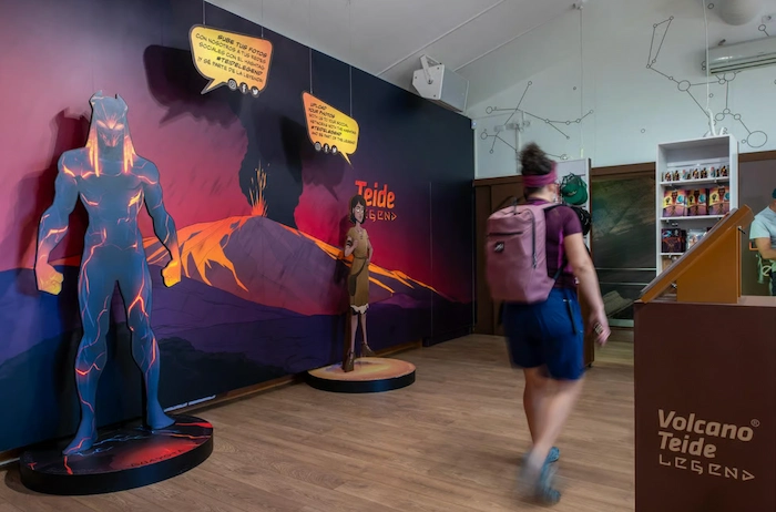 Visitor entering the Teide Legends exhibition at Volcano Teide Visitor Center